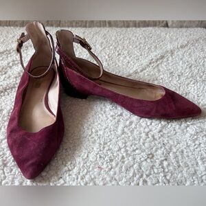 Well worn well loved burgundy shoes